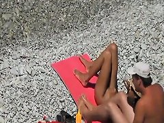 Hot Brunette Jerks Off Her Mans Dick At Public Beach